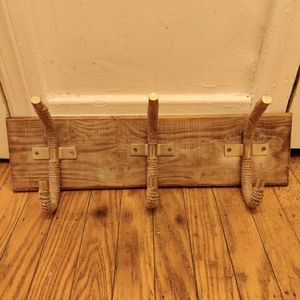 Wooden wall coat rack